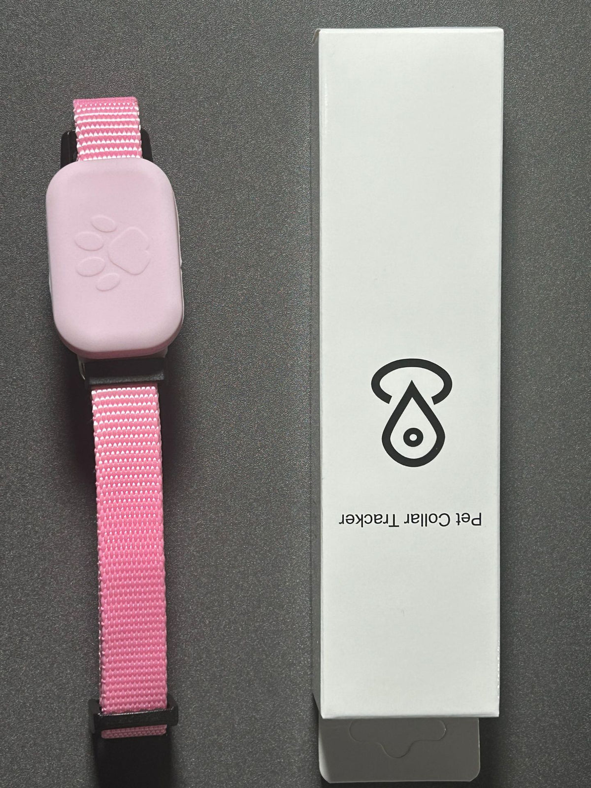 Pink Find My compatible pet collar with tracker tag and retail box