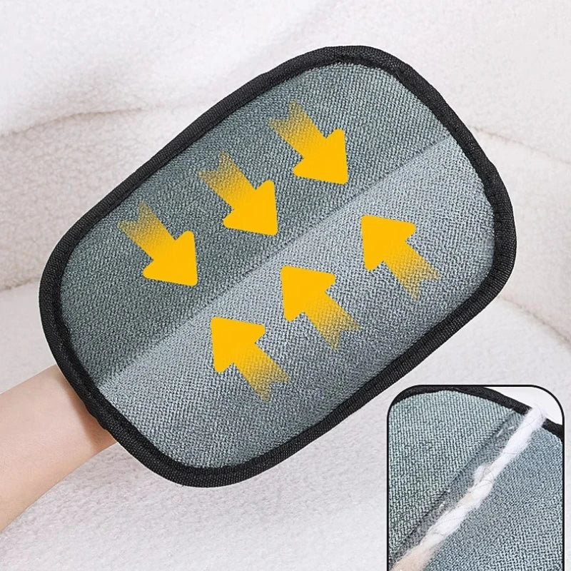 Close-up of Comfort Zone Pets pet hair remover fabric side with arrows showing the gliding direction