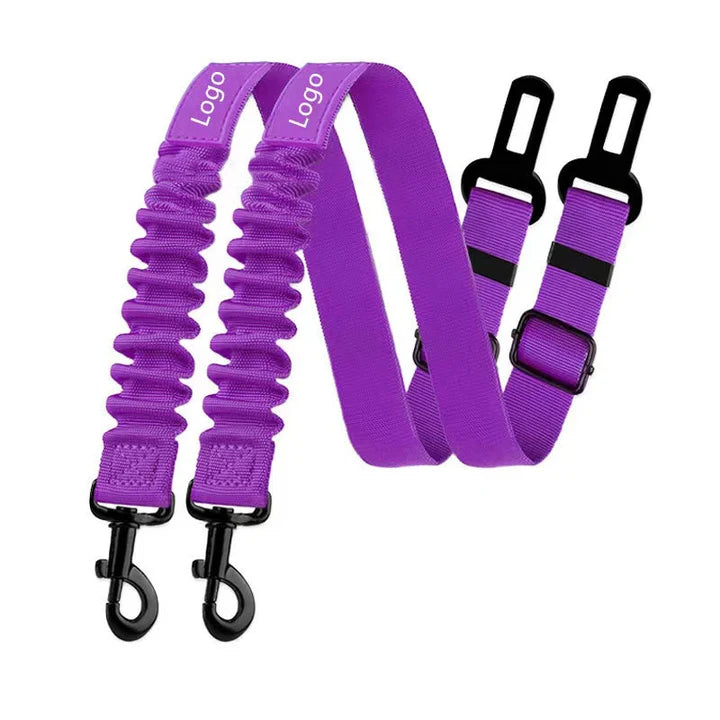 Purple adjustable dog car seat belt with dual clips, elastic bungee design, and secure vehicle restraint.